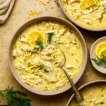 Avgolemono Soup with Orzo in rustic bowl