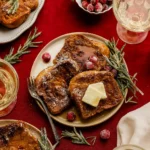 easiest gingerbread french toast on a plate with syrup and butter