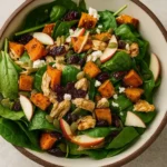 Fall Harvest Salad Recipe in rustic bowl with autumn decor