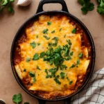 Ground Beef Enchiladas baked with melted cheese and sauce