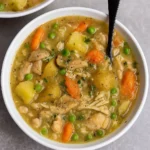 Slow Cooker Chicken Stew in rustic bowl