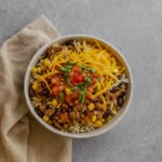 Hearty Ground Beef Burrito Bowl with rice, beef, and cheese