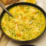 Mediterranean Lemon Chicken Soup in rustic bowl