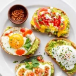 Avocado Toast with Egg breakfast on rustic table