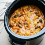 Crock Pot Beef Stew in rustic bowl
