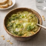 Garlicky Cabbage Soup in a rustic bowl