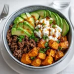 Ground Beef Hot Honey Bowl dinner with avocado and hot honey drizzle