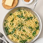 Spinach Lemon Pasta in bowl with lemon zest