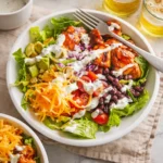 A fresh BBQ Chicken Salad with smoky chicken and charred corn.
