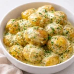 Creamy Garlic Sauce Baby Potatoes in a rustic bowl