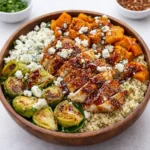 Healthy Hot Honey Chicken Quinoa Bowl with roasted vegetables