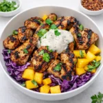 Jerk Chicken and Mango Slaw Bowls with grilled chicken and fresh mango