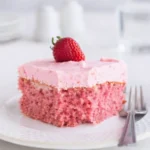Strawberry Sheet Cake with Cream Cheese Frosting on table