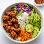 Sweet Chili Chicken Rice Bowls with Chicken Thighs in a ceramic bowl