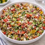 Fresh Mediterranean chopped salad with feta and olives in a bowl