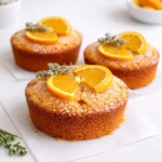 Golden Orange ginger honey cakes with citrus garnish