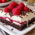 A delicious layered Raspberry Chocolate Lasagna Dessert with fresh berries.