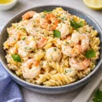 Creamy Seafood Pasta Salad with shrimp and crab in a bowl